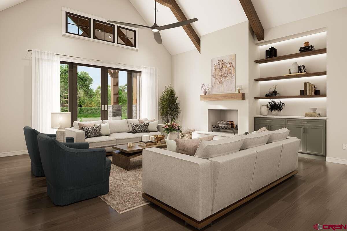 18371 2325 Road Cedaredge, CO 81413 - Photo 5 of 14 a living room with furniture fireplace and flat screen tv