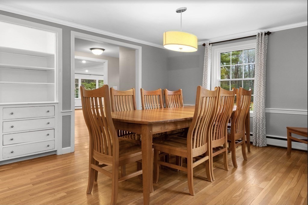 14 Kelsey Road Boxford, MA 01921 - Photo 9 of 39 a view of a dining room with furniture and wooden floor