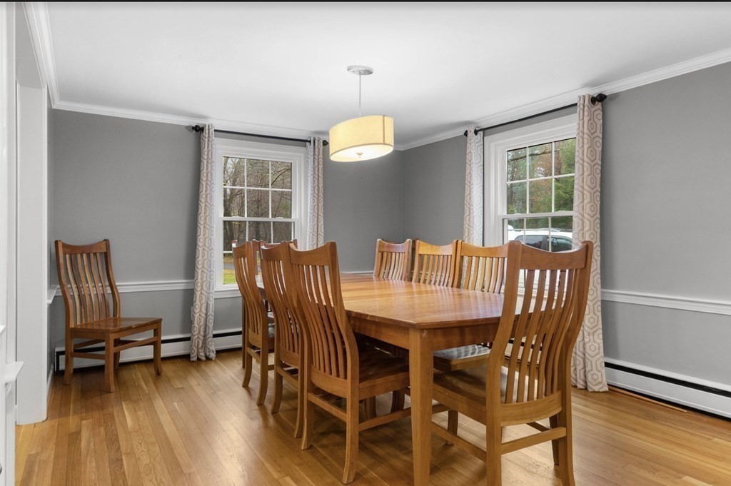 14 Kelsey Road Boxford, MA 01921 - Photo 10 of 39 a view of a dining room with furniture window and wooden floor