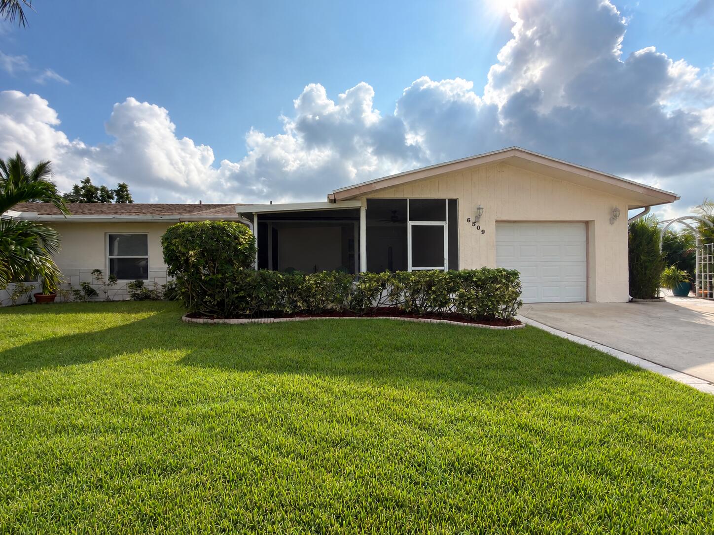6309 Dusenburg Road Delray Beach, FL 33484 - Photo 25 of 26 Lush, natural front lawn refresh