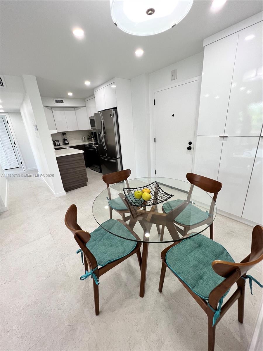 3304 Virginia Street, Unit 6B Miami, FL 33133 - Photo 2 of 15 a living room with furniture