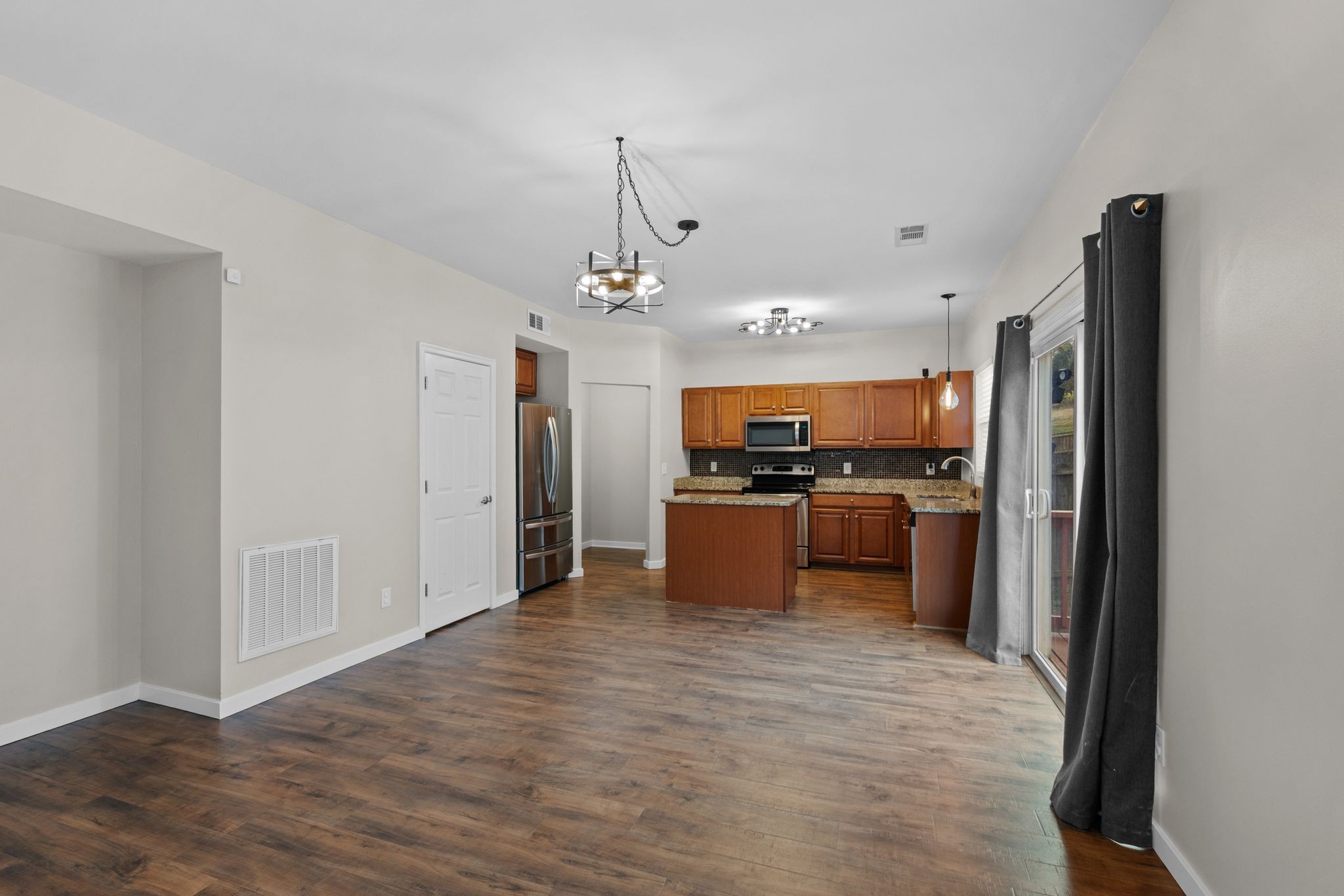 2569 Jordan Ridge Drive Nashville, TN 37218 - Photo 16 of 46 a kitchen with stainless steel appliances a refrigerator and a stove top oven