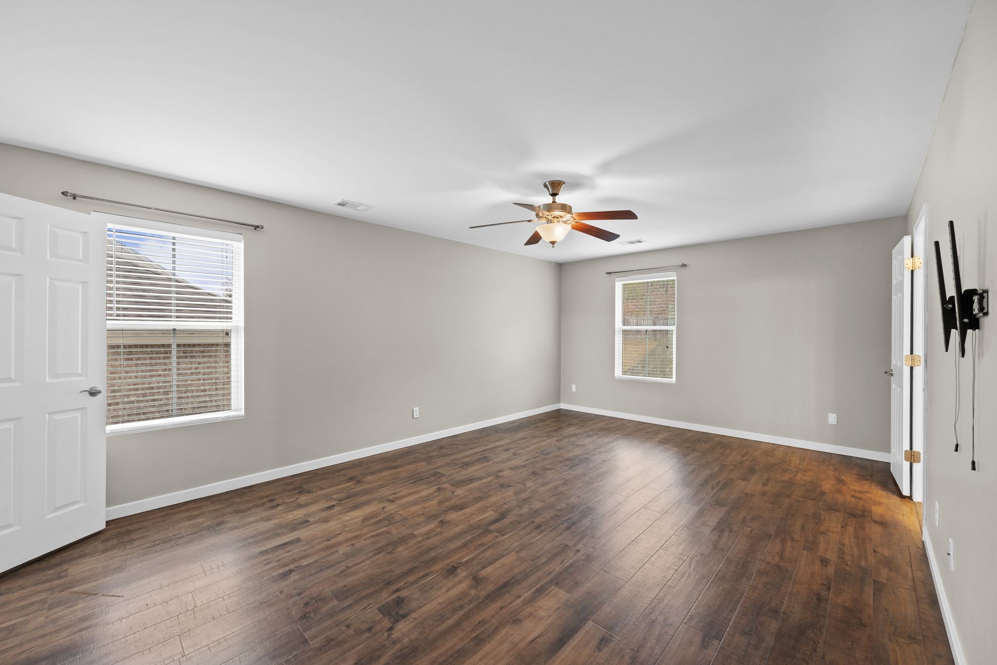 2569 Jordan Ridge Drive Nashville, TN 37218 - Photo 23 of 46 a view of an empty room with a window and wooden floor