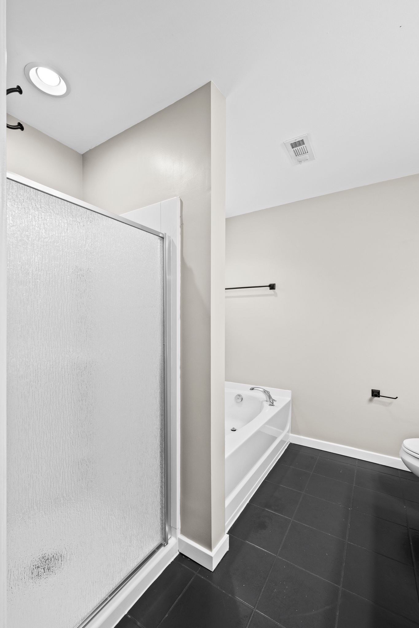 2569 Jordan Ridge Drive Nashville, TN 37218 - Photo 27 of 46 a bathroom with a tub and shower