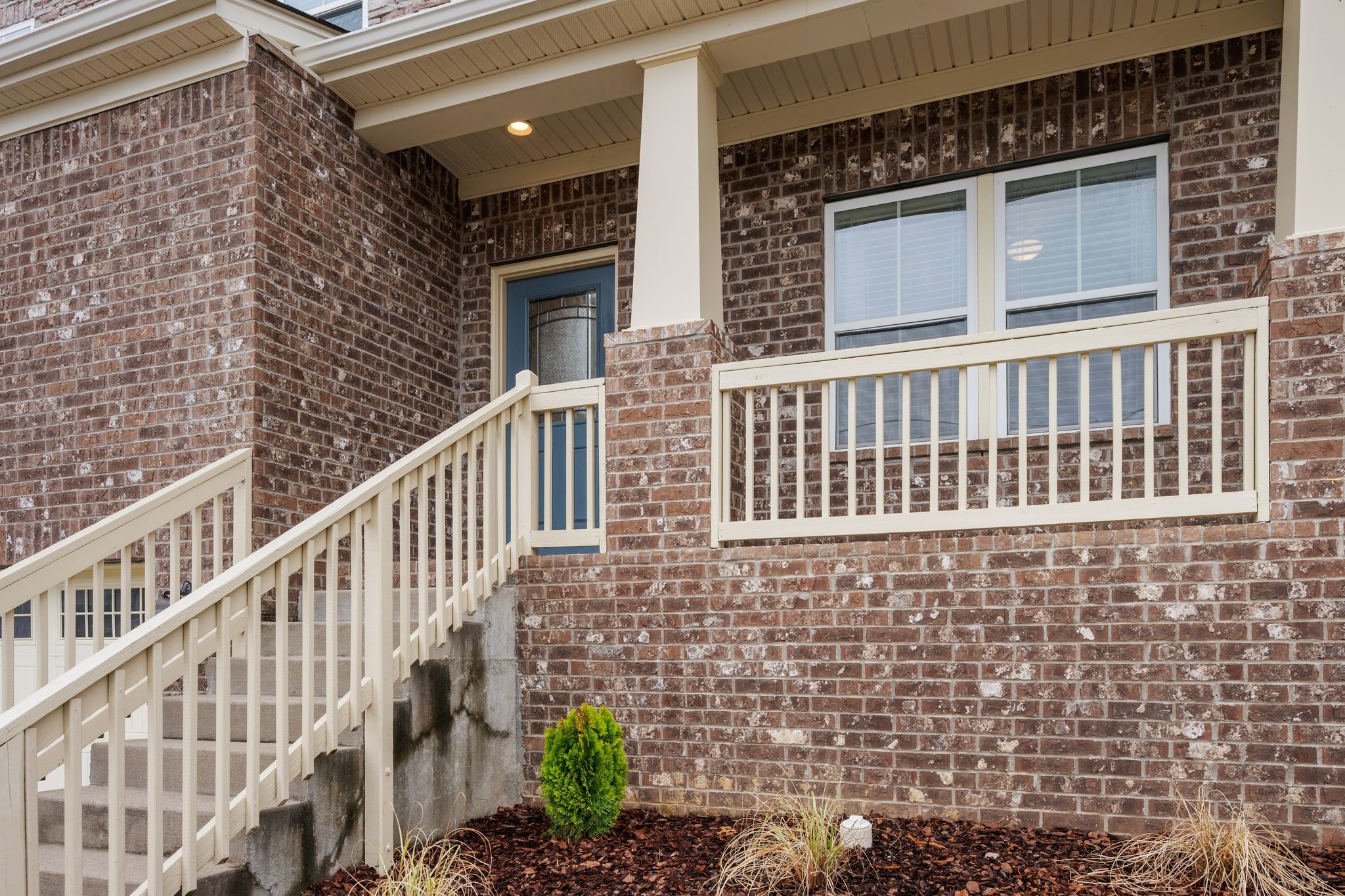 2569 Jordan Ridge Drive Nashville, TN 37218 - Photo 3 of 46 a view of a brick house with a small window