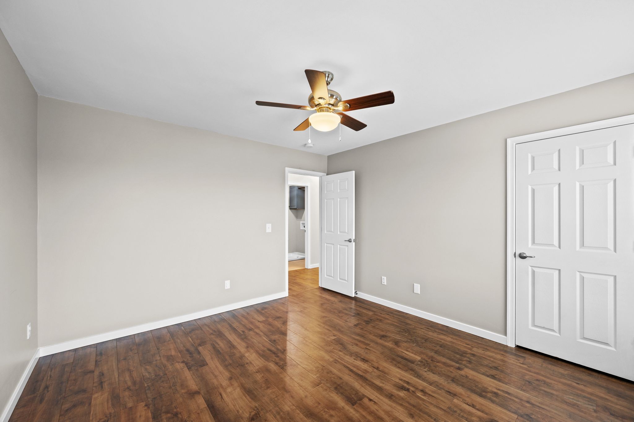 2569 Jordan Ridge Drive Nashville, TN 37218 - Photo 34 of 46 a view of a room with wooden floor and a ceiling fan