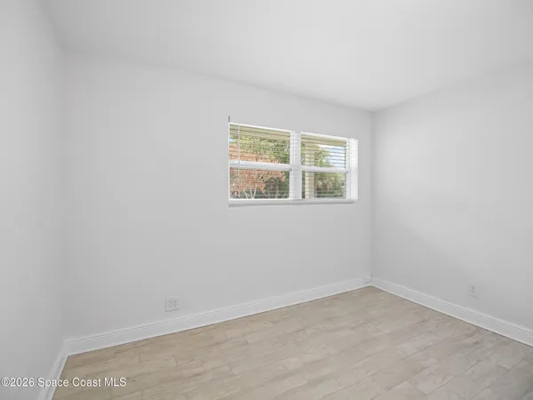 a bathroom with a sink a vanity and a mirror