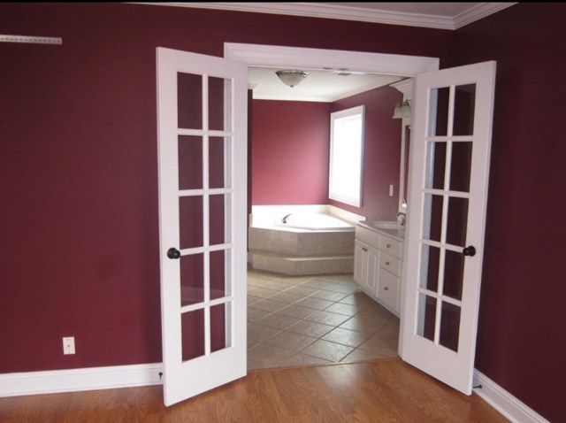 6793 Houston Road Macon, GA 31216 - Photo 13 of 22 a bathroom with a sink and a large mirror