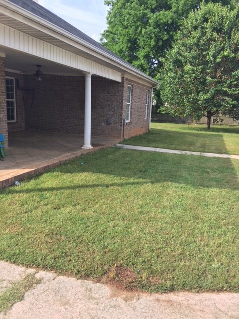 6793 Houston Road Macon, GA 31216 - Photo 19 of 22 a view of a backyard