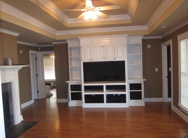 6793 Houston Road Macon, GA 31216 - Photo 6 of 22 a view of a livingroom with wooden floor and windows