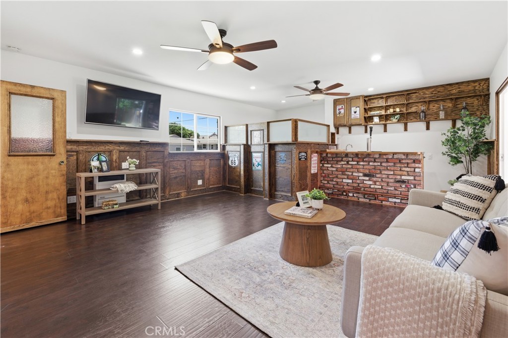 3327 North Studebaker Road Long Beach, CA 90808 - Photo 19 of 31 This 19th century inspired pub/family room features an authentic "snug" and a used brick wet bar
