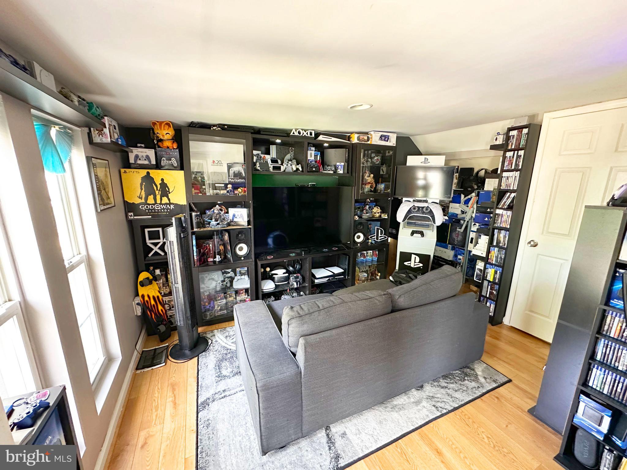 7811 Meath Road Baltimore, MD 21222 - Photo 11 of 52 a view of a living room with furniture and storage