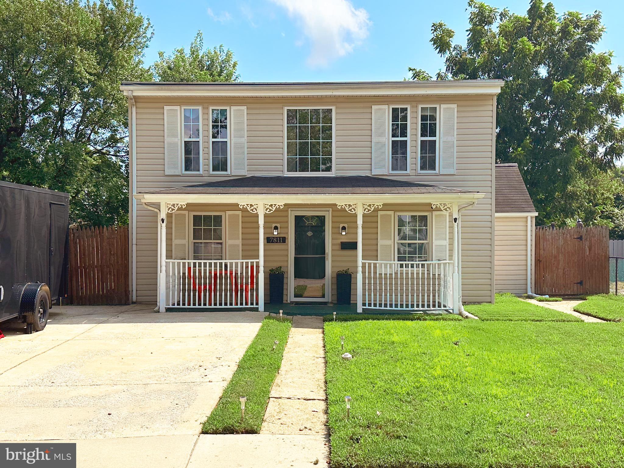 7811 Meath Road Baltimore, MD 21222 - Photo 2 of 52 a front view of a house with a garden