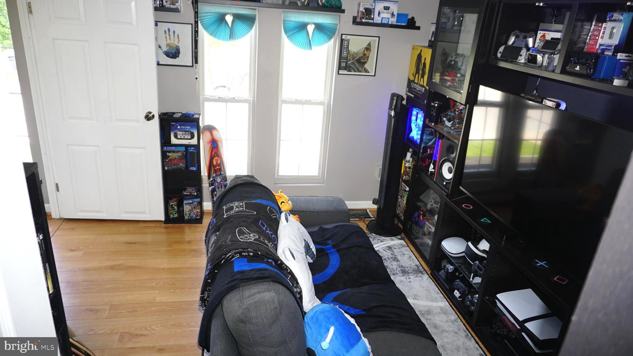7811 Meath Road Baltimore, MD 21222 - Photo 26 of 52 a room with lots of stuff and hardwood floor