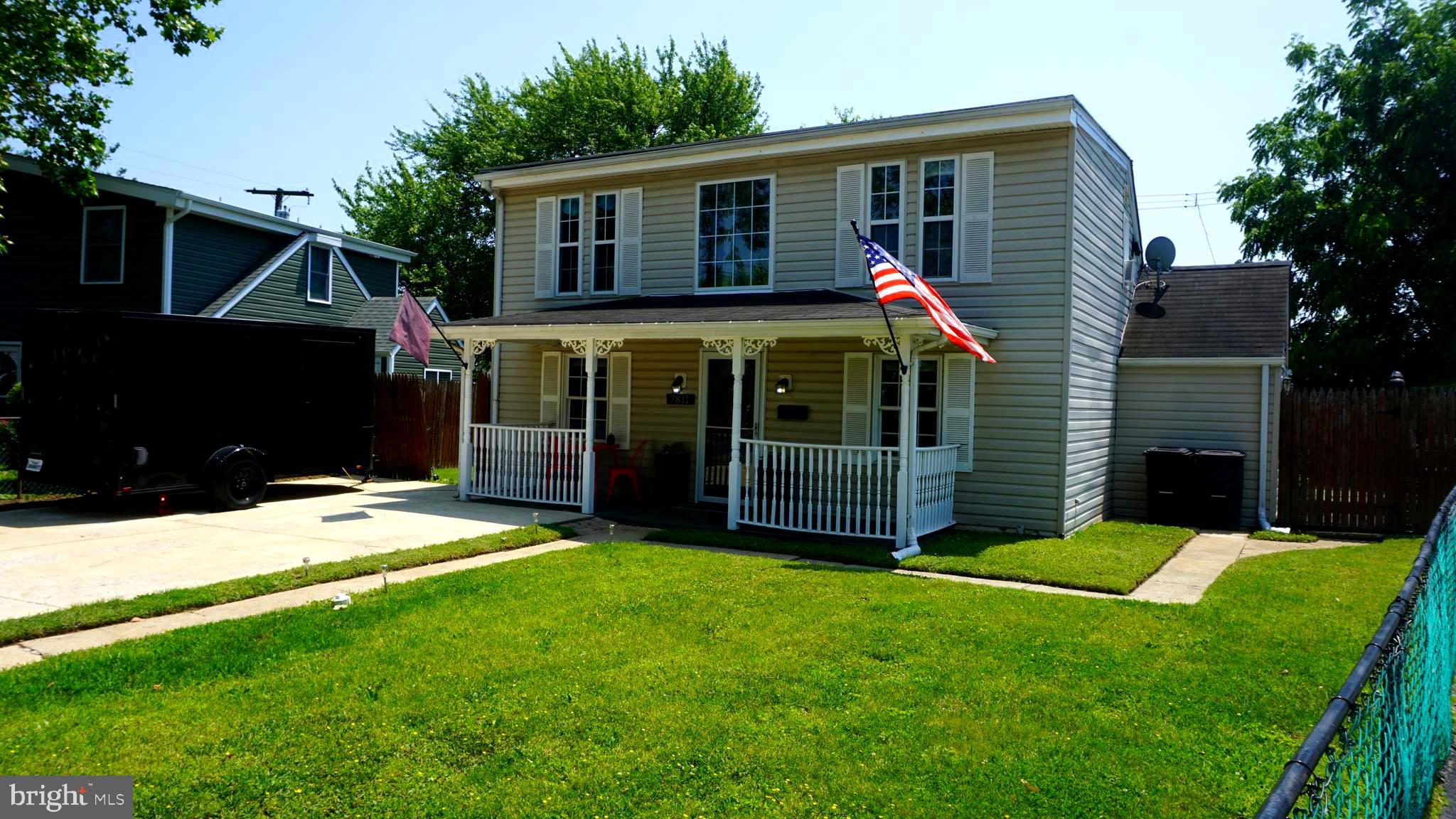 7811 Meath Road Baltimore, MD 21222 - Photo 34 of 52 a view of a house with a yard and deck
