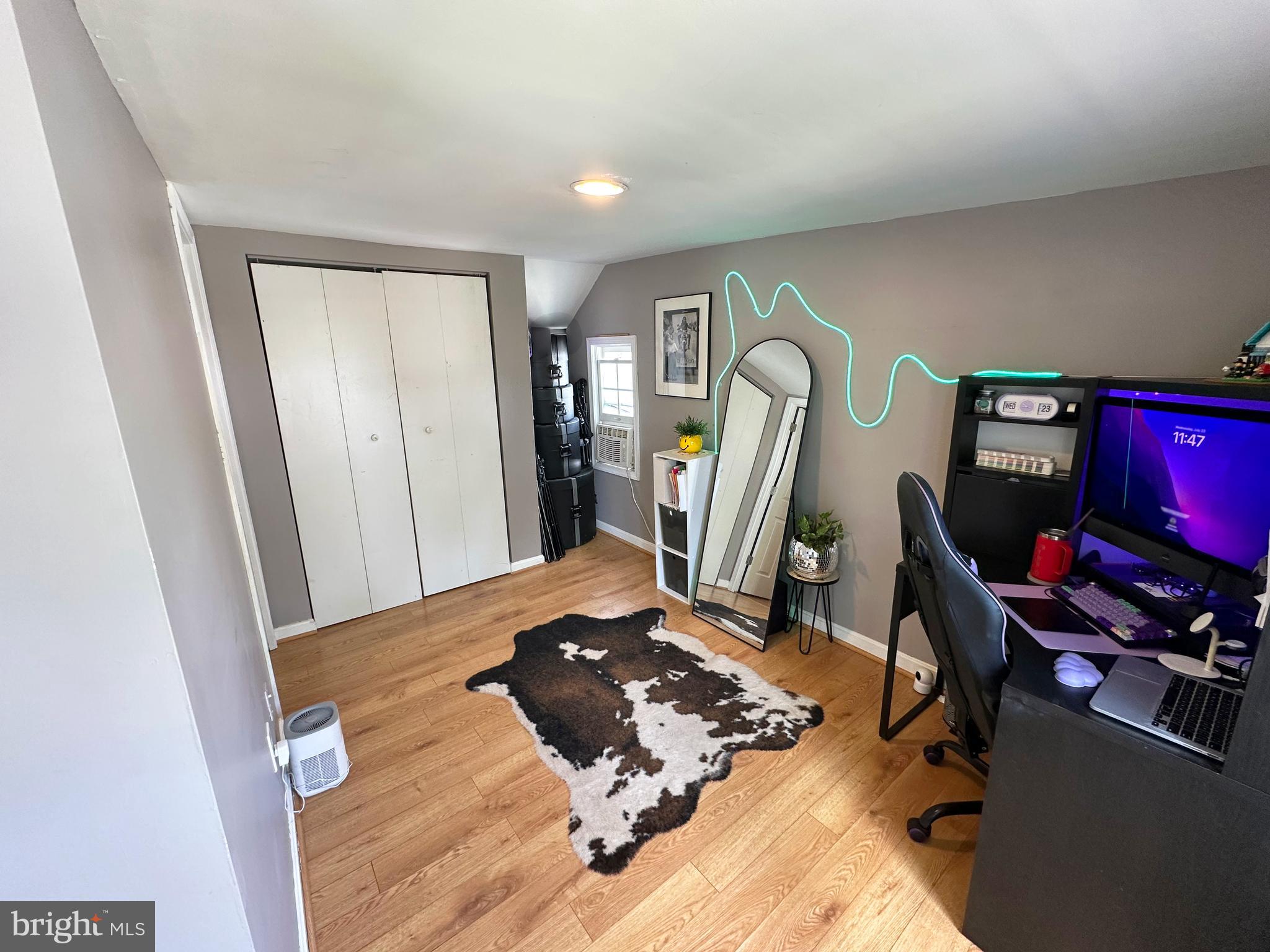 7811 Meath Road Baltimore, MD 21222 - Photo 45 of 52 a view of a workspace with furniture and a window