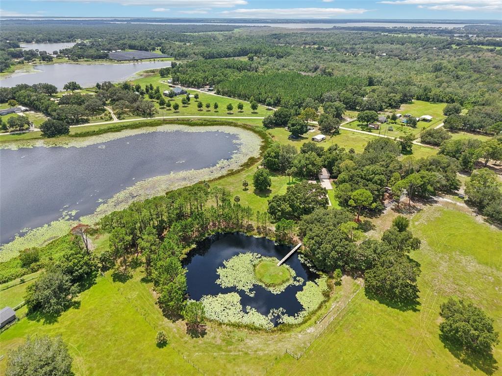 40610 Babb Road Umatilla, FL 32784 - Photo 2 of 45 a view of a lake with a mountain