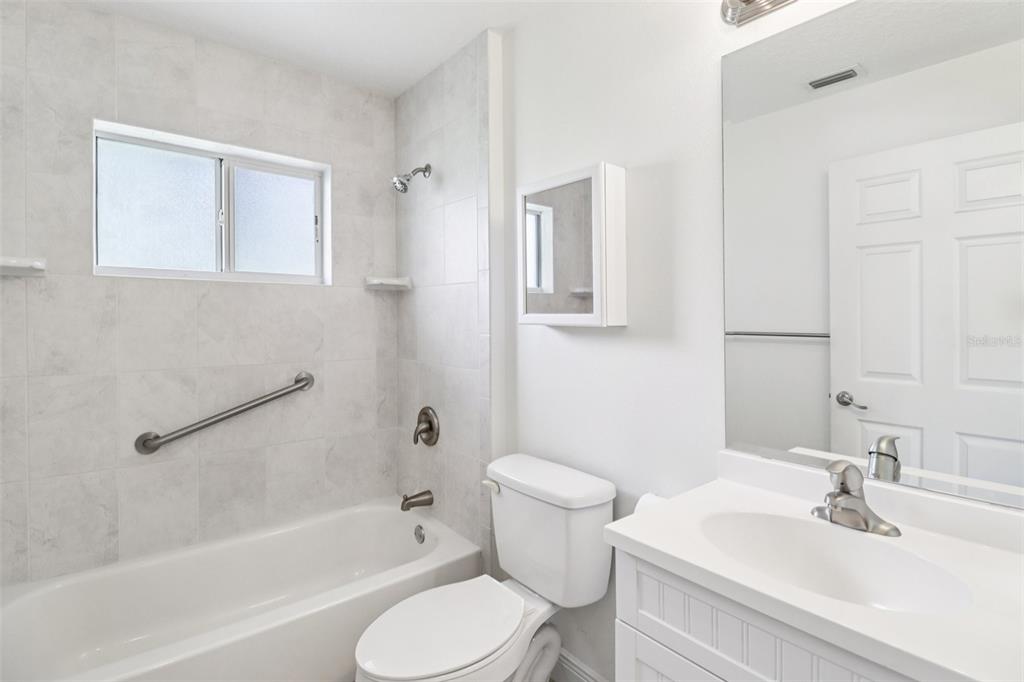 40610 Babb Road Umatilla, FL 32784 - Photo 27 of 45 a bathroom with a sink toilet and bathtub