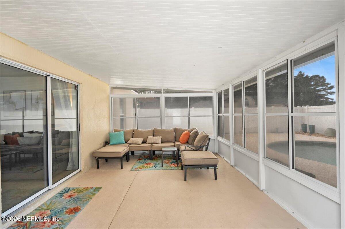 10310 Woodley Point Road Jacksonville, FL 32218 - Photo 22 of 30 a living room with furniture