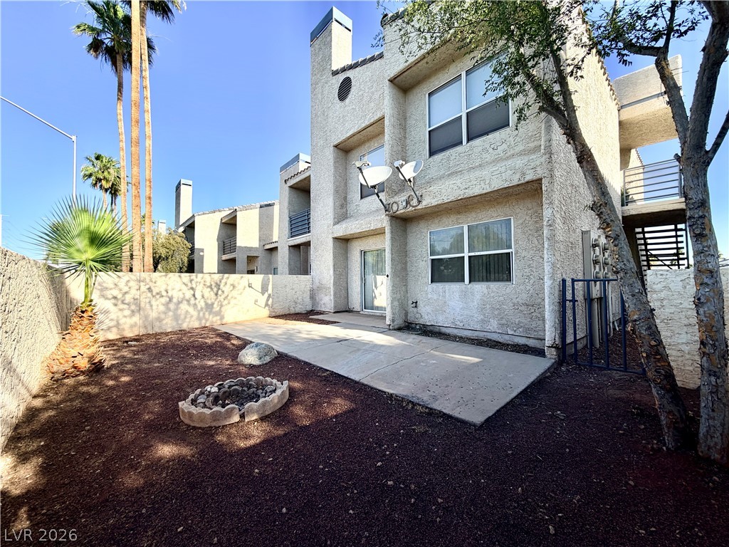 6250 West Flamingo Road, Unit 4 Las Vegas, NV 89103 - Photo 36 of 45 This private outdoor space offers a fire pit, ideal for evening relaxation and enjoyment.