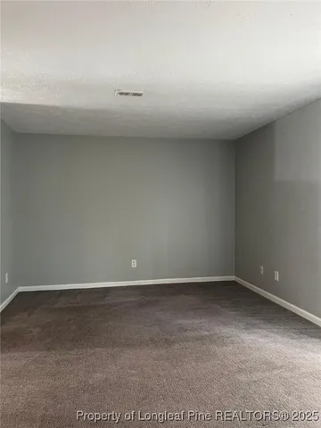 a kitchen with kitchen island cabinets and sink