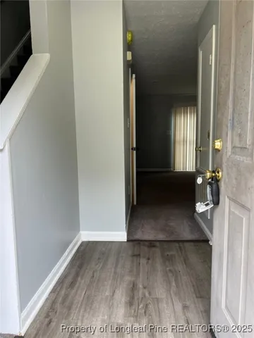 a kitchen with a stove and a microwave