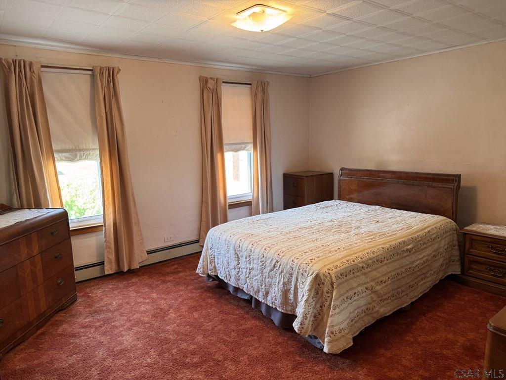 139 Reed Street Elmora, PA 15737 - Photo 17 of 23 a bedroom with a bed and window