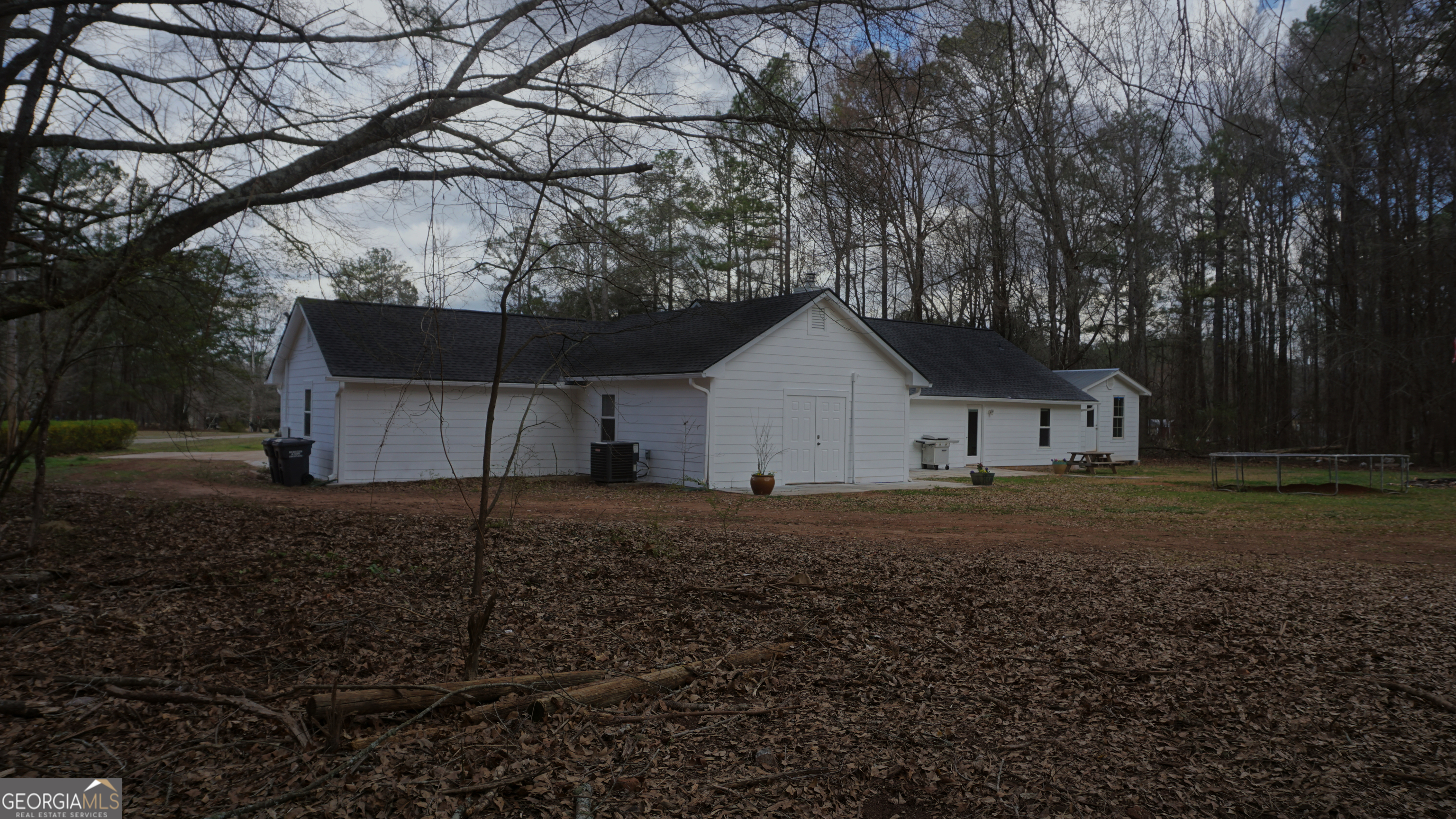 135 Dixie Lane Covington, GA 30014 - Photo 80 of 85 Back of Home and Large Backyard