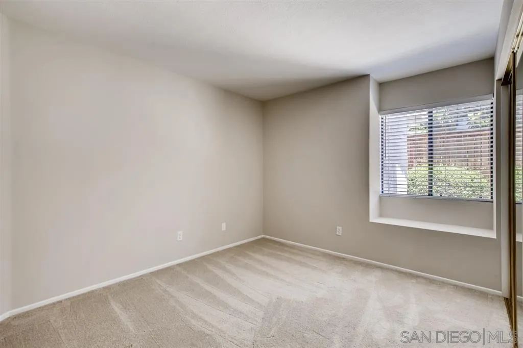 5034 Frazee Road Oceanside, CA 92057 - Photo 21 of 25 an empty room with a window