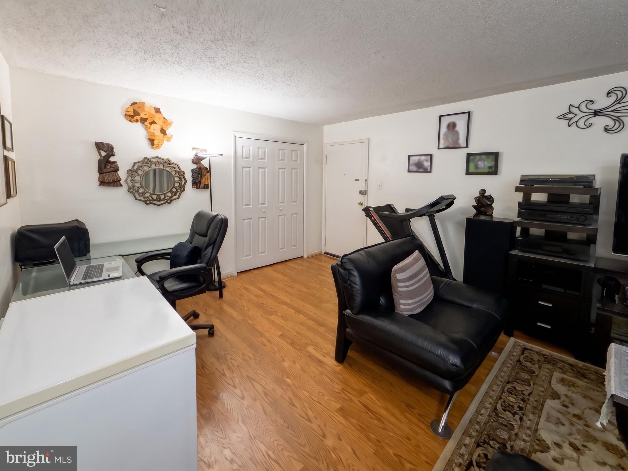 1822 Metzerott Road, Unit 401 Hyattsville, MD 20783 - Photo 6 of 22 a living room with furniture