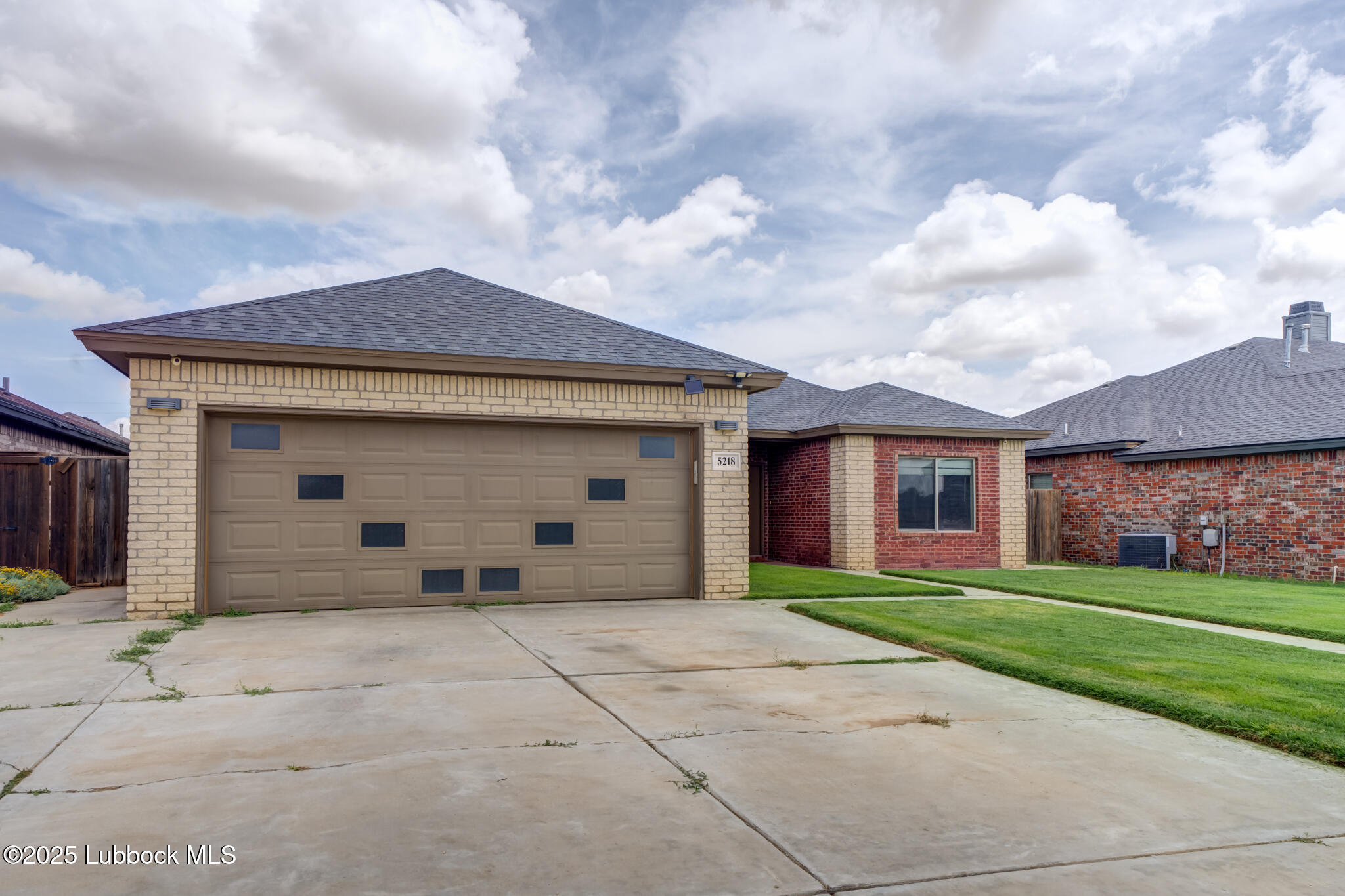 5218 Lehigh Street Lubbock, TX 79416 - Photo 2 of 39 front view of a house with a yard
