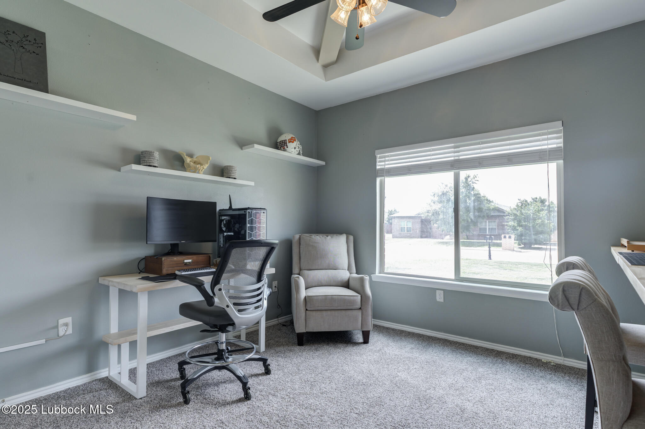 5218 Lehigh Street Lubbock, TX 79416 - Photo 34 of 39 a workspace with furniture and a window