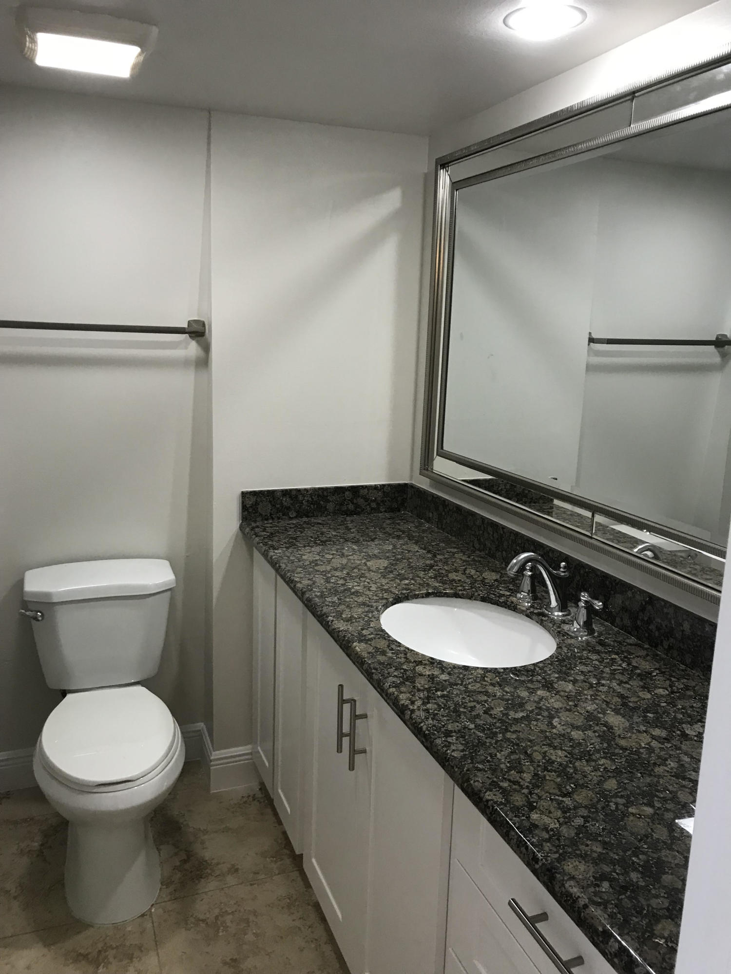 3900 County Line Road, Unit 4B Tequesta, FL 33469 - Photo 6 of 8 mater bathroom