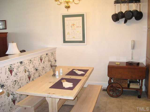 3426 Barron Berkeley Way Raleigh, NC 27612 - Photo 5 of 14 Convenient breakfast area with tile floor Breakfast Area