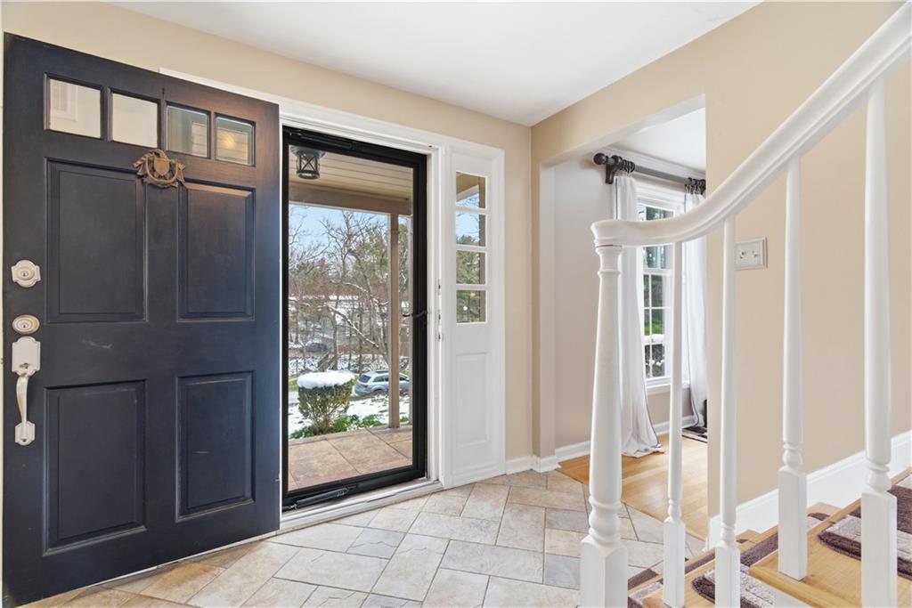 1800 Murdstone Road Upper St. Clair, PA 15241 - Photo 3 of 29 a view of entryway with window and front door