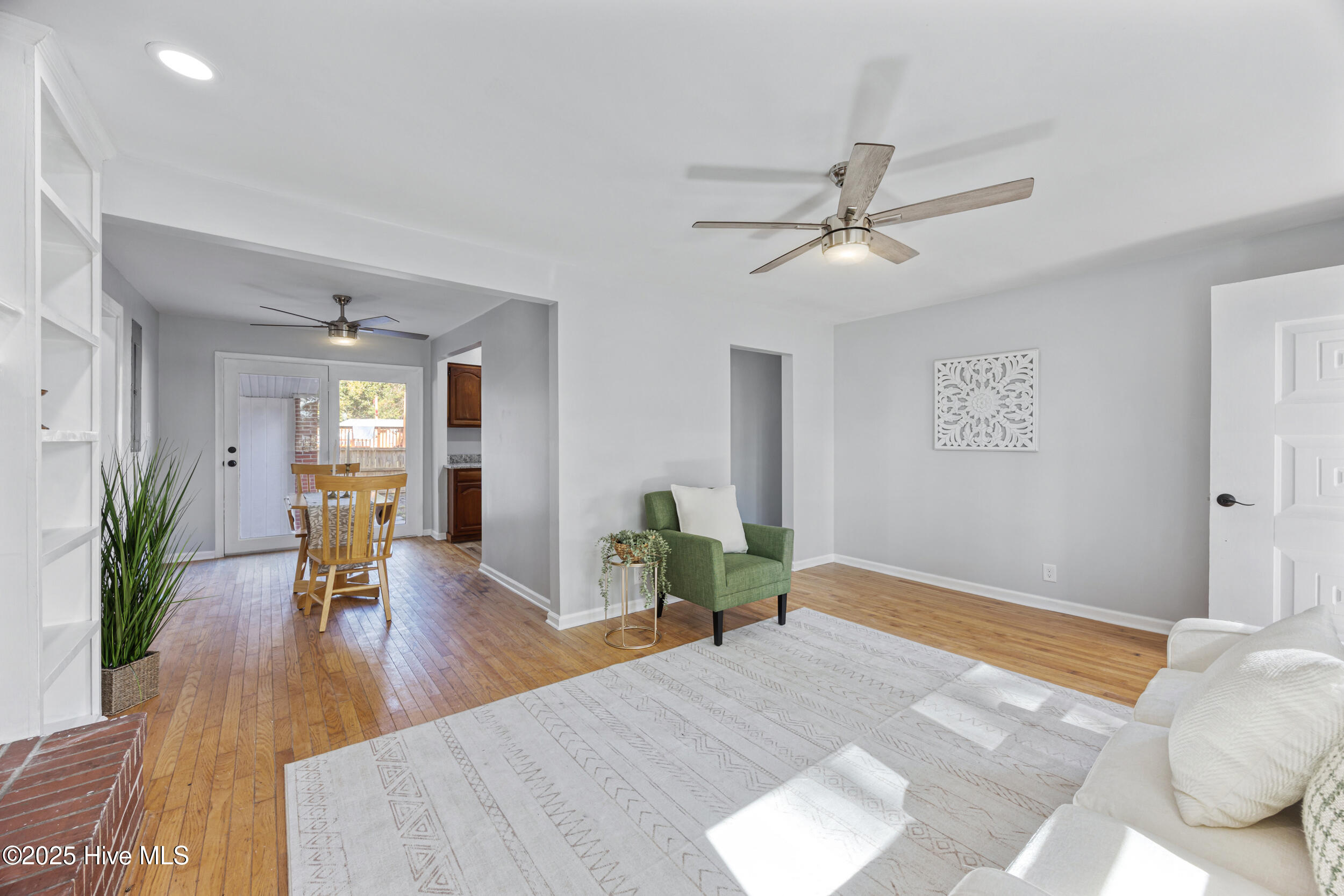115 Pine Street Hertford, NC 27944 - Photo 4 of 24 Wood floors open to dining area