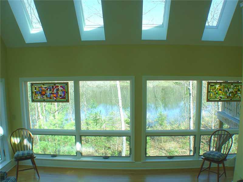 80 Enid Melrose Road Stoneham, ME 04231 - Photo 15 of 31 Living Room. There s the Pond -...