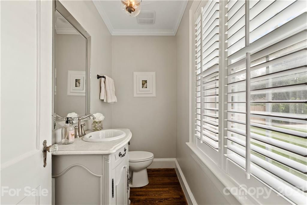 1305 Lilac Road Charlotte, NC 28209 - Photo 20 of 47 a bathroom with a sink and a toilet