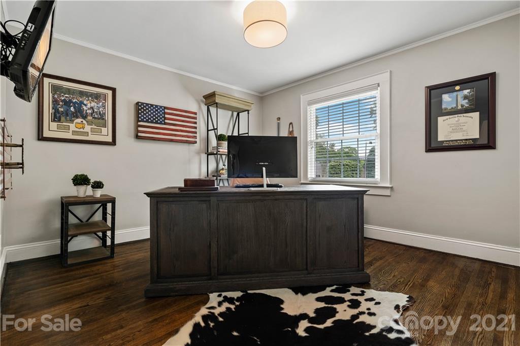 1305 Lilac Road Charlotte, NC 28209 - Photo 23 of 47 a room with a wooden floor and a window
