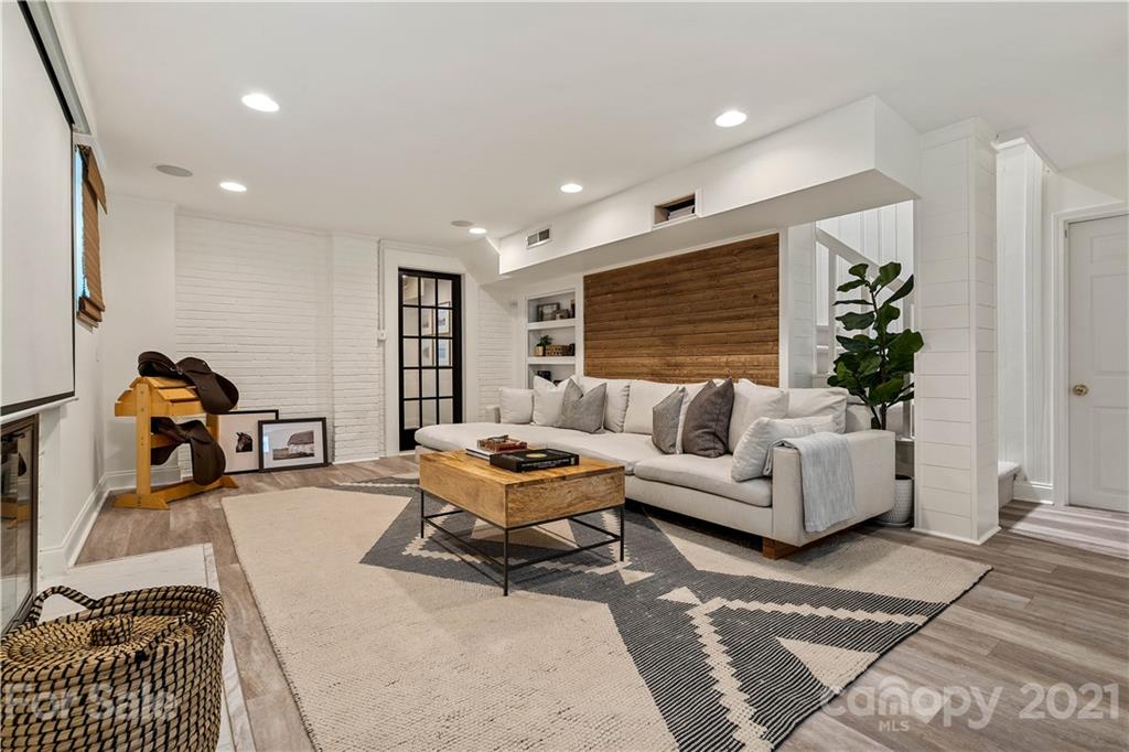 1305 Lilac Road Charlotte, NC 28209 - Photo 25 of 47 a living room with furniture