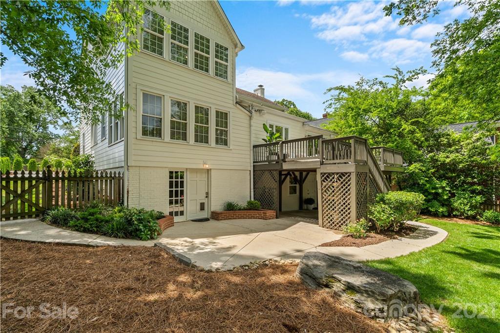 1305 Lilac Road Charlotte, NC 28209 - Photo 36 of 47 a front view of a house with a yard