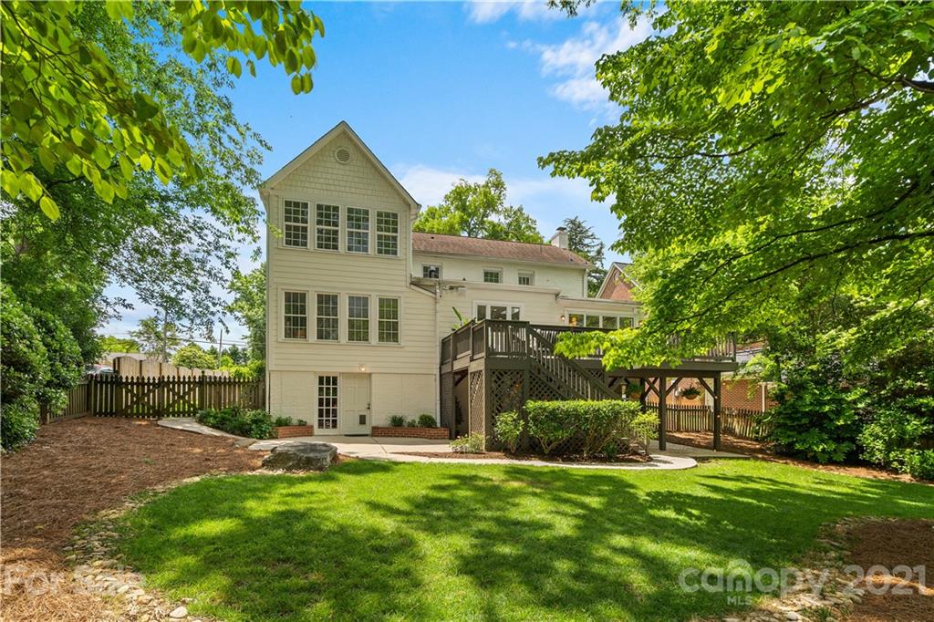 1305 Lilac Road Charlotte, NC 28209 - Photo 37 of 47 a front view of a house with a garden
