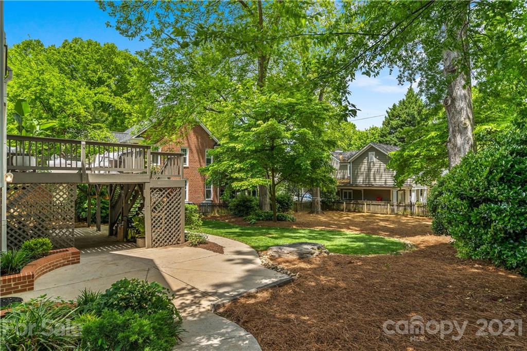 1305 Lilac Road Charlotte, NC 28209 - Photo 39 of 47 a front view of a house with a yard and tree