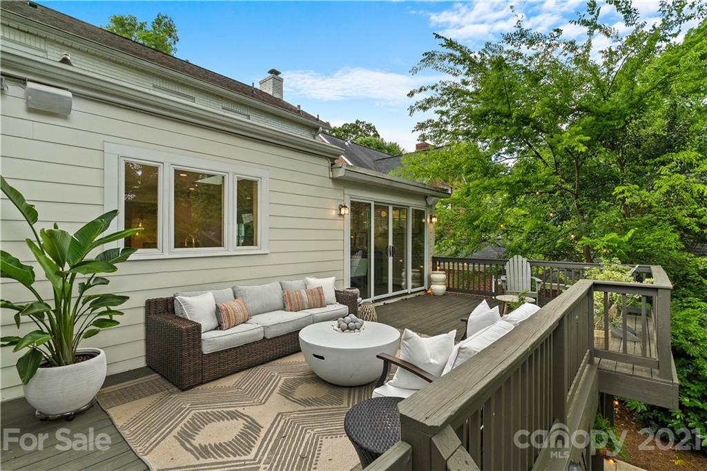 1305 Lilac Road Charlotte, NC 28209 - Photo 42 of 47 a view of a patio with couches and potted plants