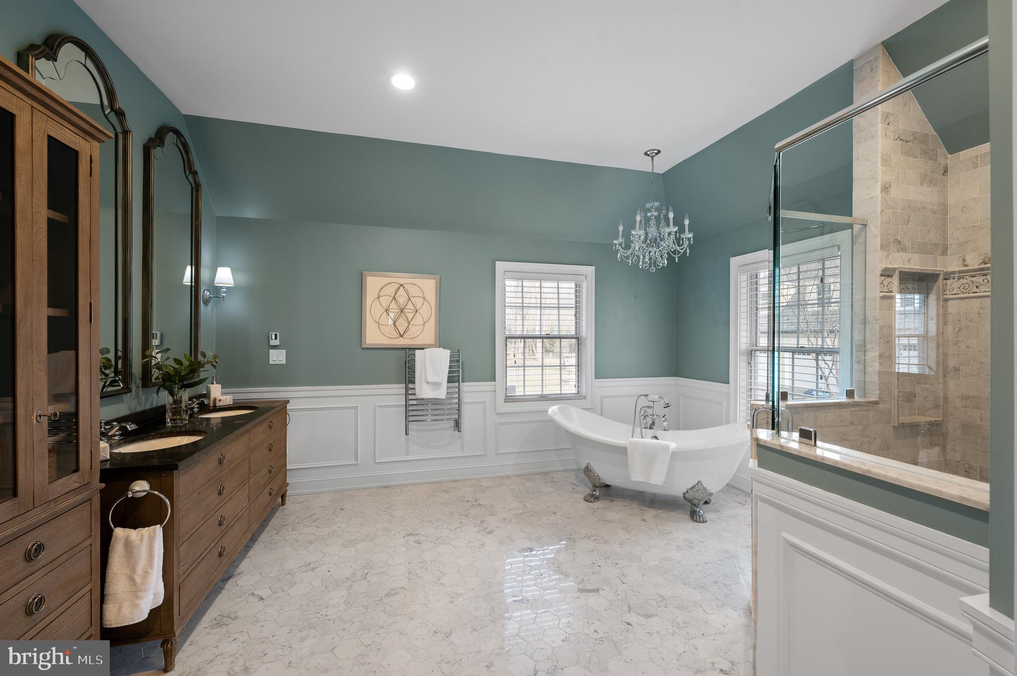115 Jaffrey Road Malvern, PA 19355 - Photo 22 of 46 a spacious bathroom with a double vanity sink a large mirror and bathtub