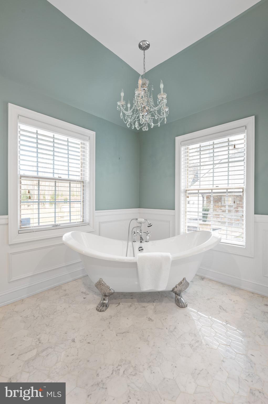 115 Jaffrey Road Malvern, PA 19355 - Photo 23 of 46 a bathroom with a bathtub and a large window
