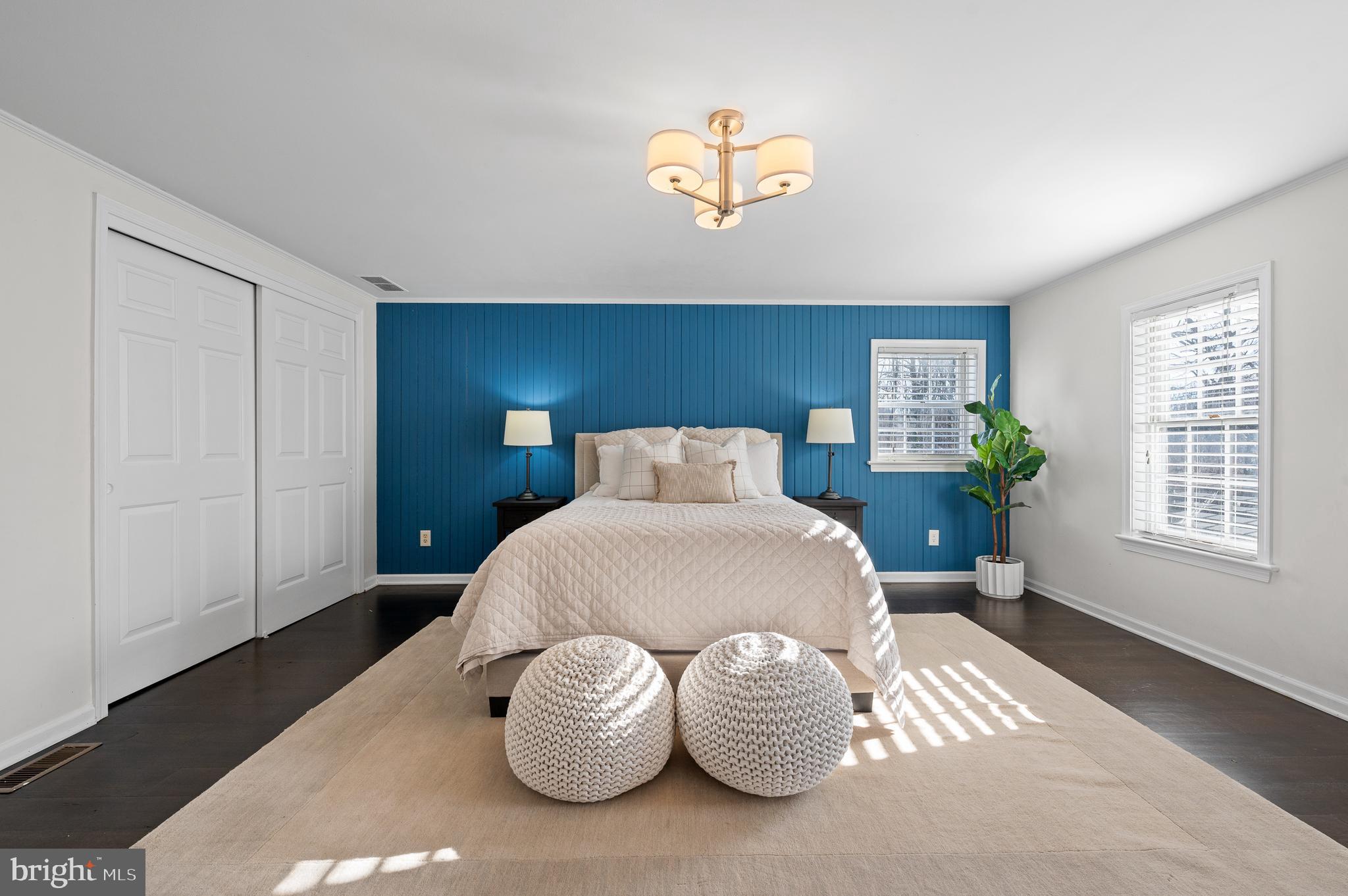 115 Jaffrey Road Malvern, PA 19355 - Photo 32 of 46 a spacious bedroom with a bed and a window