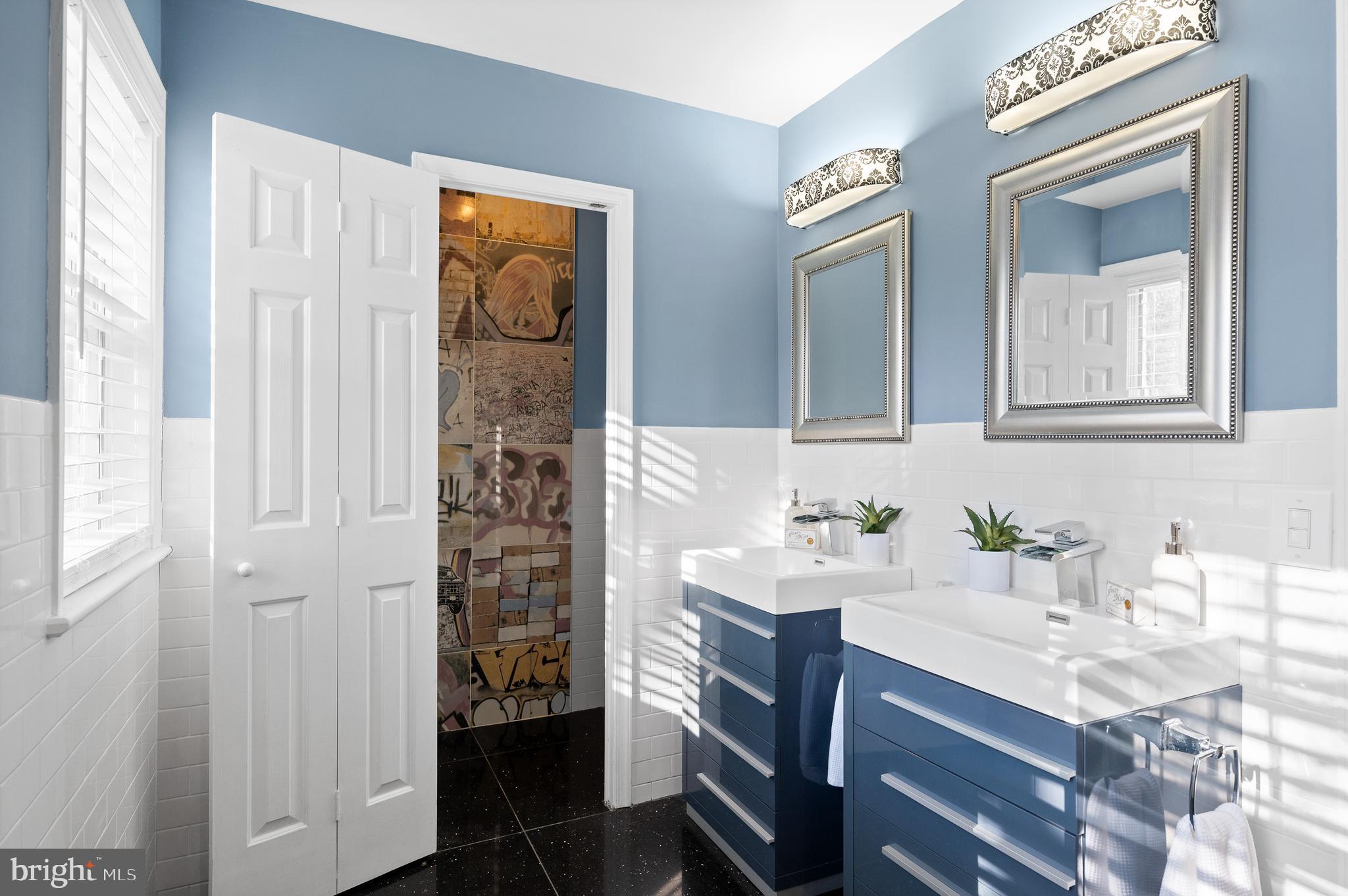 115 Jaffrey Road Malvern, PA 19355 - Photo 35 of 46 a bathroom with a sink a mirror and a shower