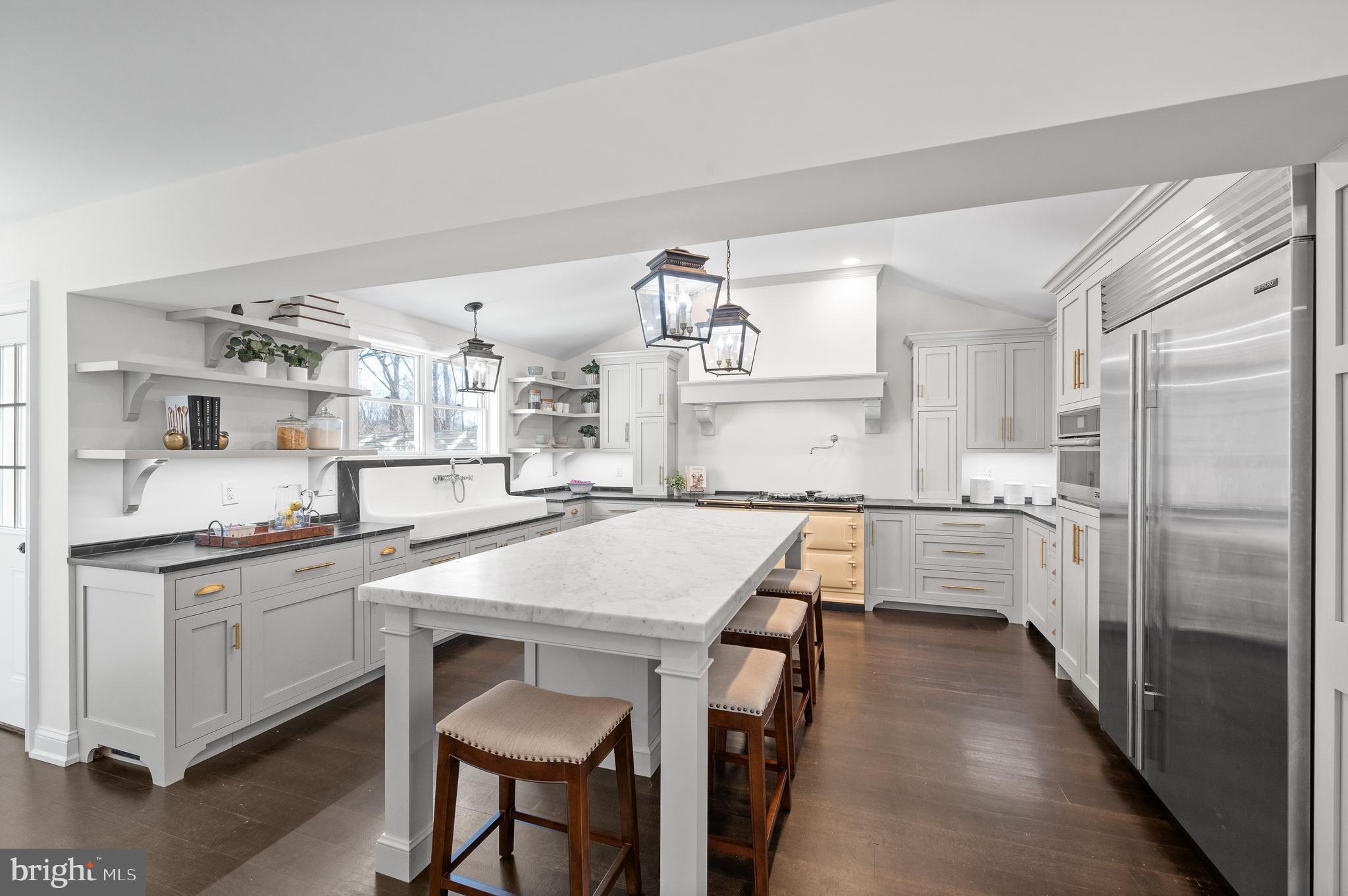 115 Jaffrey Road Malvern, PA 19355 - Photo 5 of 46 a kitchen with granite countertop a sink stove and refrigerator