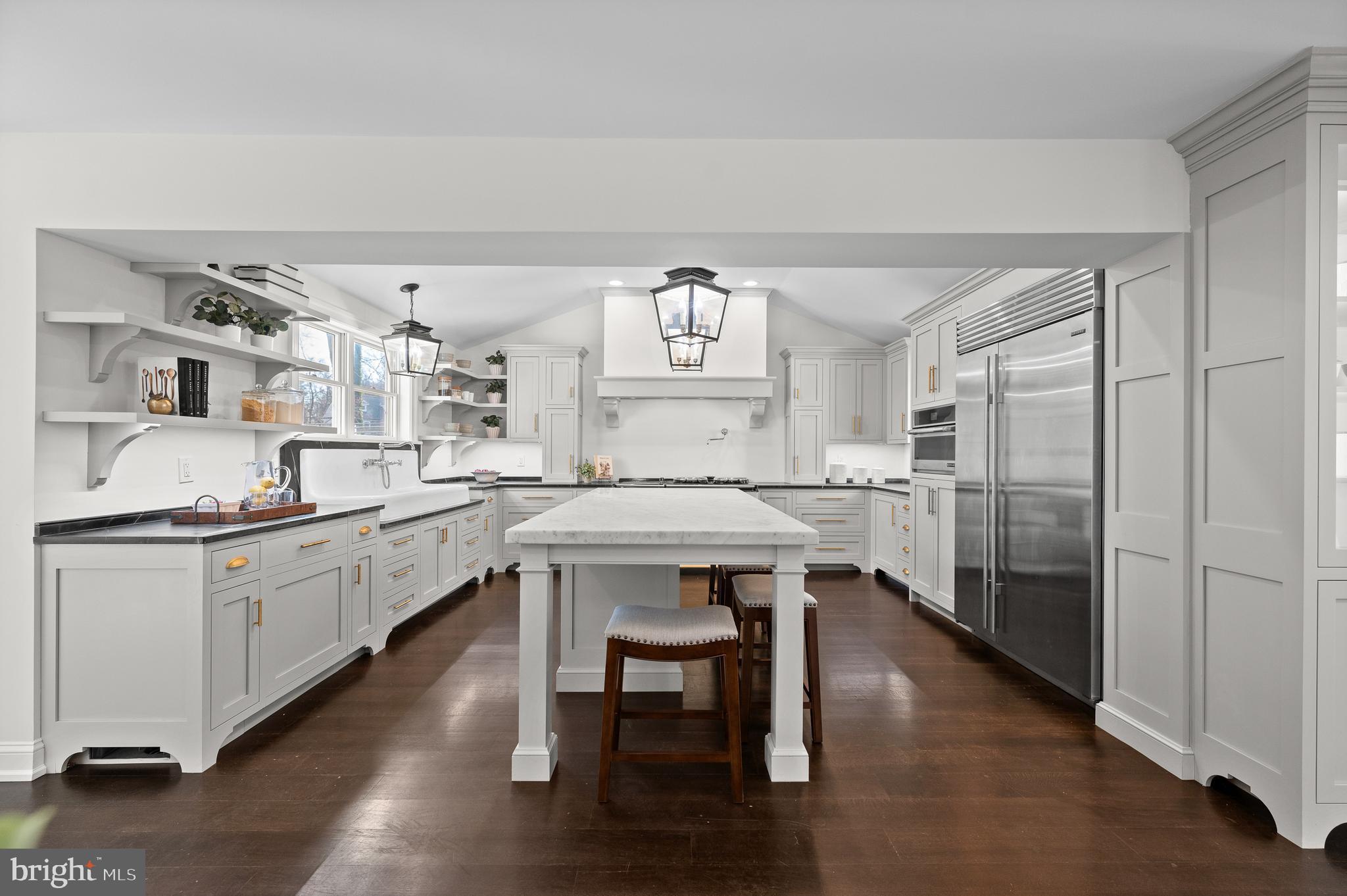 115 Jaffrey Road Malvern, PA 19355 - Photo 6 of 46 a kitchen with granite countertop a sink cabinets and wooden floor